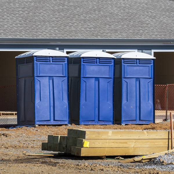 what is the cost difference between standard and deluxe portable toilet rentals in Lakeland